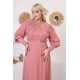 Evening dress with exquisite embellishments and a pink necklace